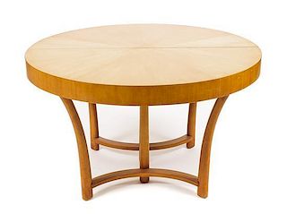 A Mid Century Modern Birch Extending Dining Table, Height 29 x diameter 48 inches.