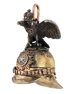 A FABERGE GOLD AND SILVER PENDANT IN A FORM OF CASQUE, WORKMASTER ERIK KOLLIN, ST.PETERSBURG, 1886-1908