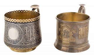 A PAIR OF RUSSIAN SILVER GILT AND NIELLO CUP HOLDERS