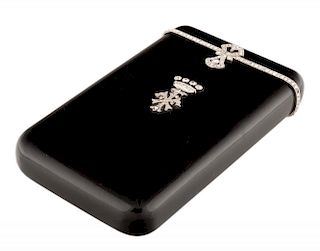 AN EARLY 20TH CENTURY ONYX AND DIAMONDS CIGARETTE CASE