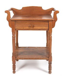 An American Walnut Wash Stand Height 33 x width 27 x depth 17 inches.