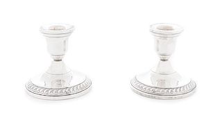 * A Pair of American Silver Weighted Candlesticks, Columbia,