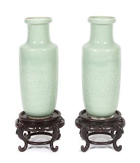 A Pair of Chinese Celadon Glazed Porcelain Vases Height of vase 13 3/4 inches.