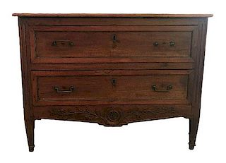 A French Provincial Carved Walnut Chest of Drawers