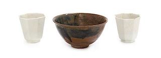 A Brown Glazed Stoneware Tea Bowl Diameter of largest 5 1/8 inches.