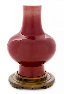 A Large Sang-de-Boeuf Glazed Porcelain Baluster Vase Height 13 1/4 inches.