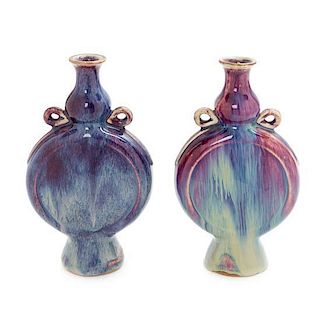 A Pair of Flambe Porcelain Flasks Height of each 9 inches.