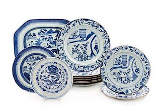 Twelve Blue and White Porcelain Plates Length of largest 13 1/2 inches.