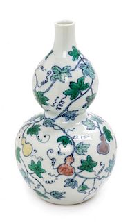 A Doucai Porcelain Gourd-Form Vase Height 7 1/2 inches.