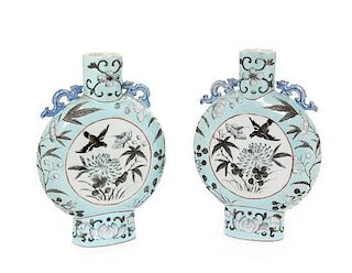 * A Pair of Grisaille Decorated Blue Ground Porcelain Moon Flasks Height 5 inches.