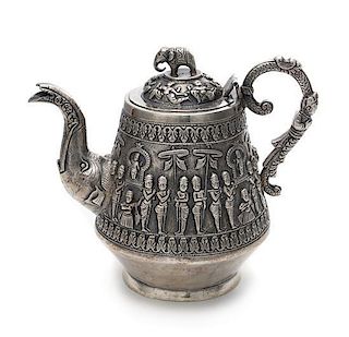An Indian Silver Teapot Height 6 1/4 inches.