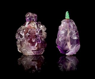 * Two Carved Amethyst Snuff Bottles Height of larger 2 1/2 inches.