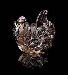 * A Smoky Quartz Snuff Bottle Height 2 1/4 inches.