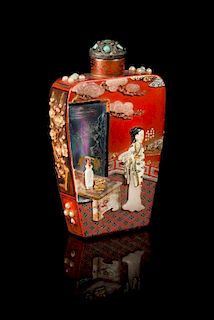 * An Embellished Lacquer on Metal Snuff Bottle Height 3 1/2 inches.