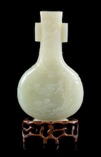 * A Small Celadon Jade Vase Height 3 5/8 inches.
