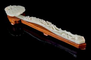 * A Carved Celadon Jade Ruyi Scepter Length 15 inches.