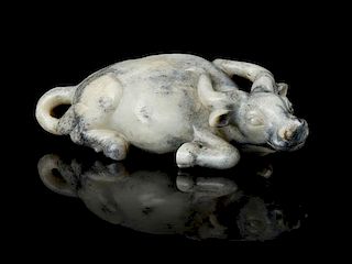 * A Grey and White Mottled Jade Figure of a Recumbent Water Buffalo Length 5 1/2 inches.