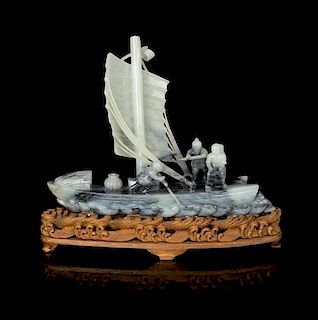 * A Grey and White Jade Model of a Boat Height 9 1/2 inches.
