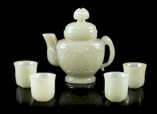 A Celadon Jade Teapot and Four Jade Teacups Height 4 1/4 inches.