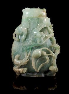 A Jadeite Covered Vase Height 5 1/4 inches.