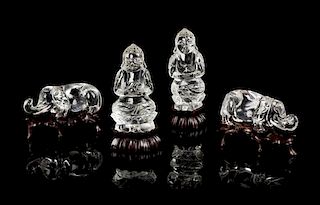 * Four Rock Crystal Figures Height 3 1/4 inches.