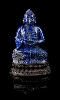 * A Lapis Lazuli Figure of Buddha Height 8 1/2 inches.