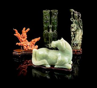 * Four Hardstone and Coral Carvings Height of highest 12 inches.