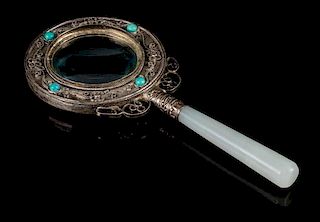 A White Jade and Silver Magnifying Glass Length 6 3/4 inches, width 3 inches.
