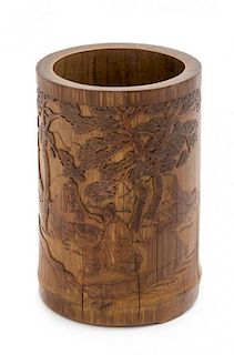 A Carved Bamboo Brushpot Height 7 inches.