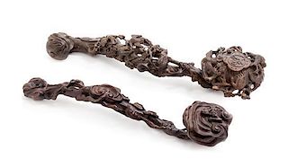 Two Carved Hardwood Ruyi Scepters Length of larger 18 1/2 inches.