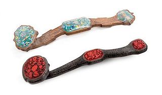 Two Hardwood Ruyi Scepters Length of larger 23 inches.