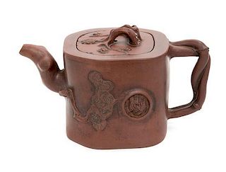 * A Yixing Pottery Teapot Height 4 inches.