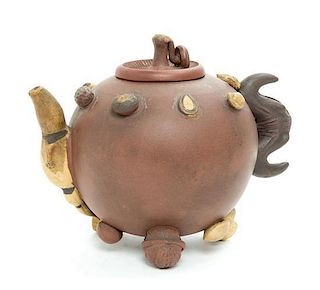 A Yixing Pottery Teapot Height 5 1/2 inches.