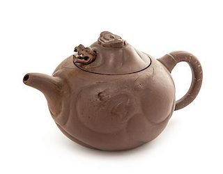 A Yixing Pottery Teapot Height 4 1/4 inches.