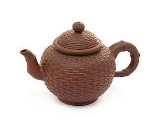 A Yixing Pottery Teapot Height 4 inches.