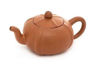 A Yixing Pottery Teapot Height 2 7/8 inches.