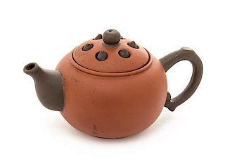A Yixing Pottery Teapot Height 2 1/2 inches.