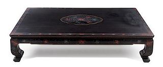 A Large Chinese Black Lacquered Coffee Table Height 13 x length 59 1/2 x depth 35 3/4 inches.