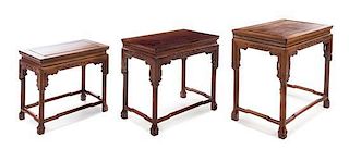 A Set of Three Chinese Rosewood Nesting Tables Height of tallest 24 x length 28 x depth 16 inches.