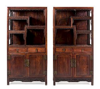 A Pair of Chinese Hardwood Displaying Cabinets 77 x 39 1/2 x 14 3/4 inches.