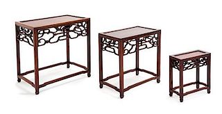 A Set of Three Chinese Hardwood Stands Height of the largest 11 inches.