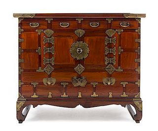 A Korean Brass Mounted Hardwood Chest Height 31 7/8 x length 37 7/8 x depth 18 inches.