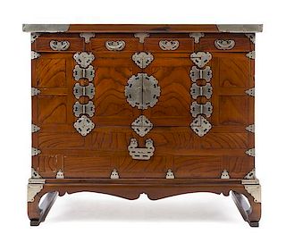 A Korean Brass Mounted Hardwood Chest Height 31 1/2 x length 37 1/8 x depyth 17 1/2 inches.