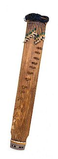 * A Wood Musical Instrument, Kayagum Length 57 1/2 x width 8 1/2 inches.