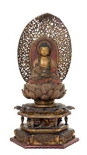 * A Git and Polychrome Painted Wood Figure of Buddha Height 24 inches.