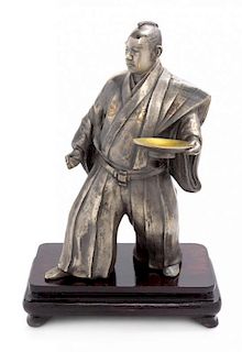 A Silvered Metal Figure of a Samurai Height 12 1/2 inches.