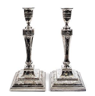 A Pair of Sheffield Plate Candlesticks, Late 18th Century, Height 12 inches.