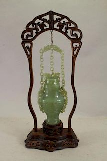 Chinese Jade Vase in Reticulated Wooden Stand