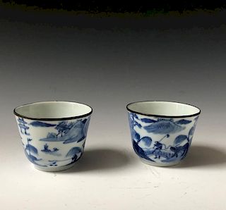A PAIR OF CHINESE ANTIQUE BLUE AND WHITE CUPS , MARKED.