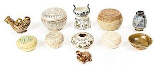A Collection of Eleven Asian Ceramic Items, Height of tallest 4 inches.